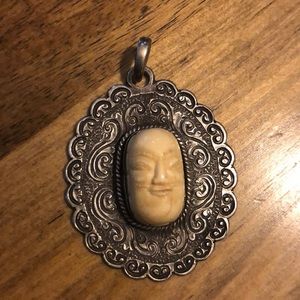 Very old, rare sterling silver Buddha pendant.